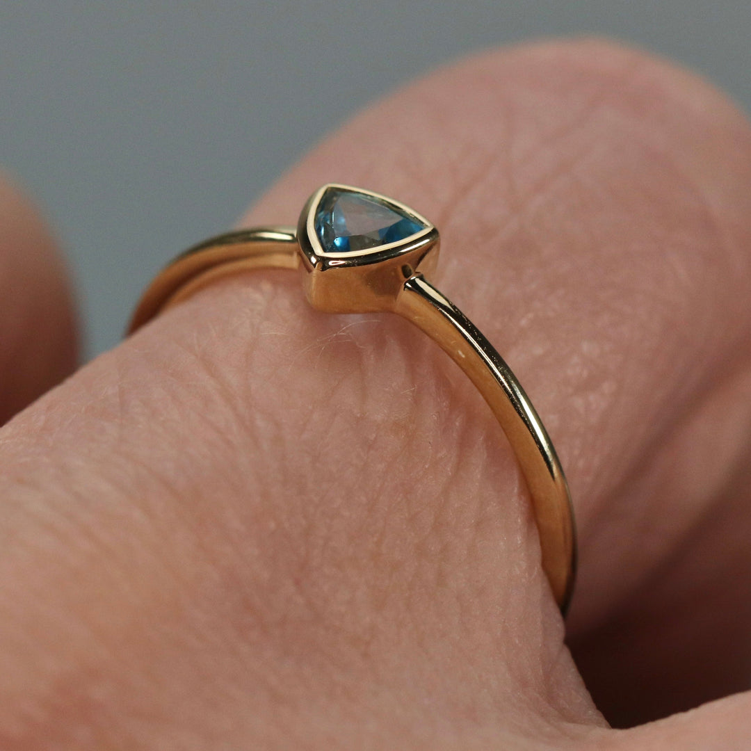 CLEARANCE! Swiss blue topaz ring in yellow gold
