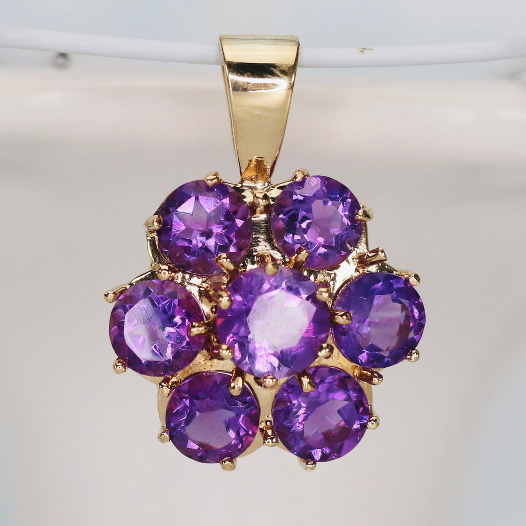 Vintage amethyst cluster pendant in yellow gold