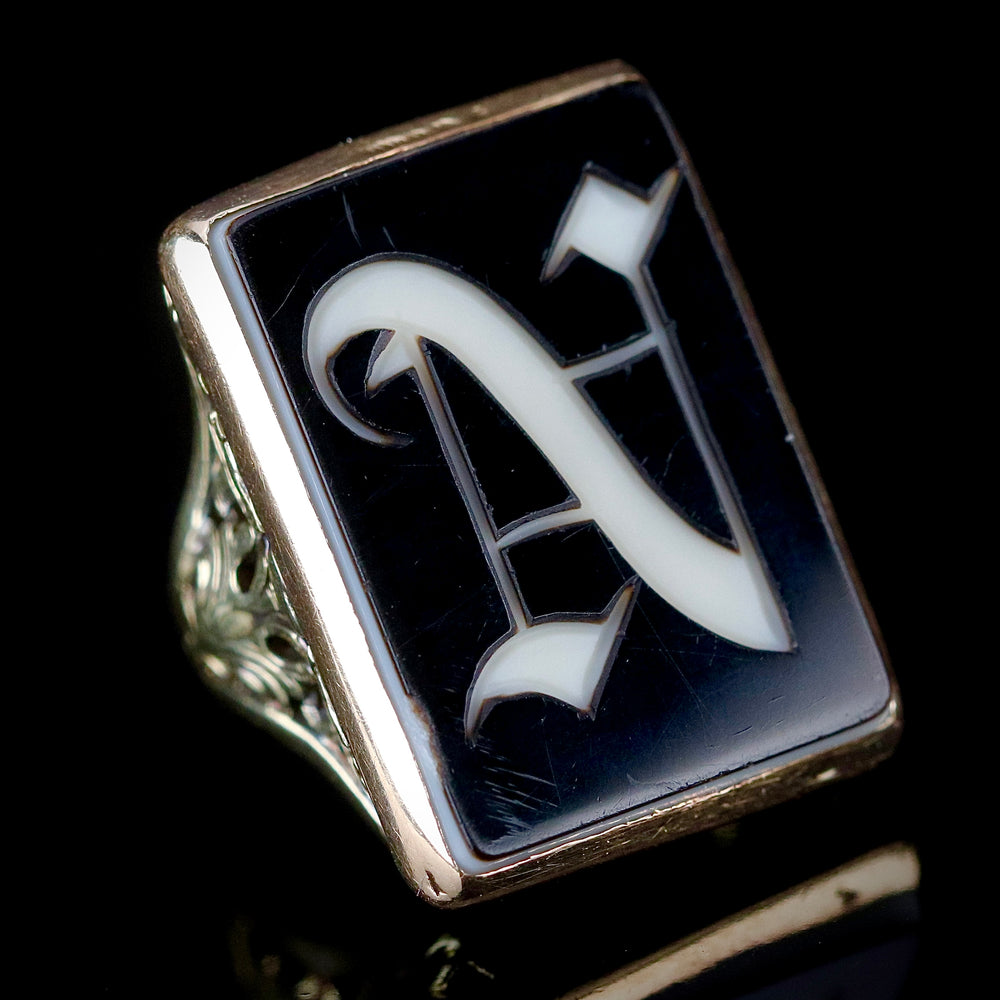 Vintage onyx ring with letter N in 14k yellow gold from Manor Jewels.