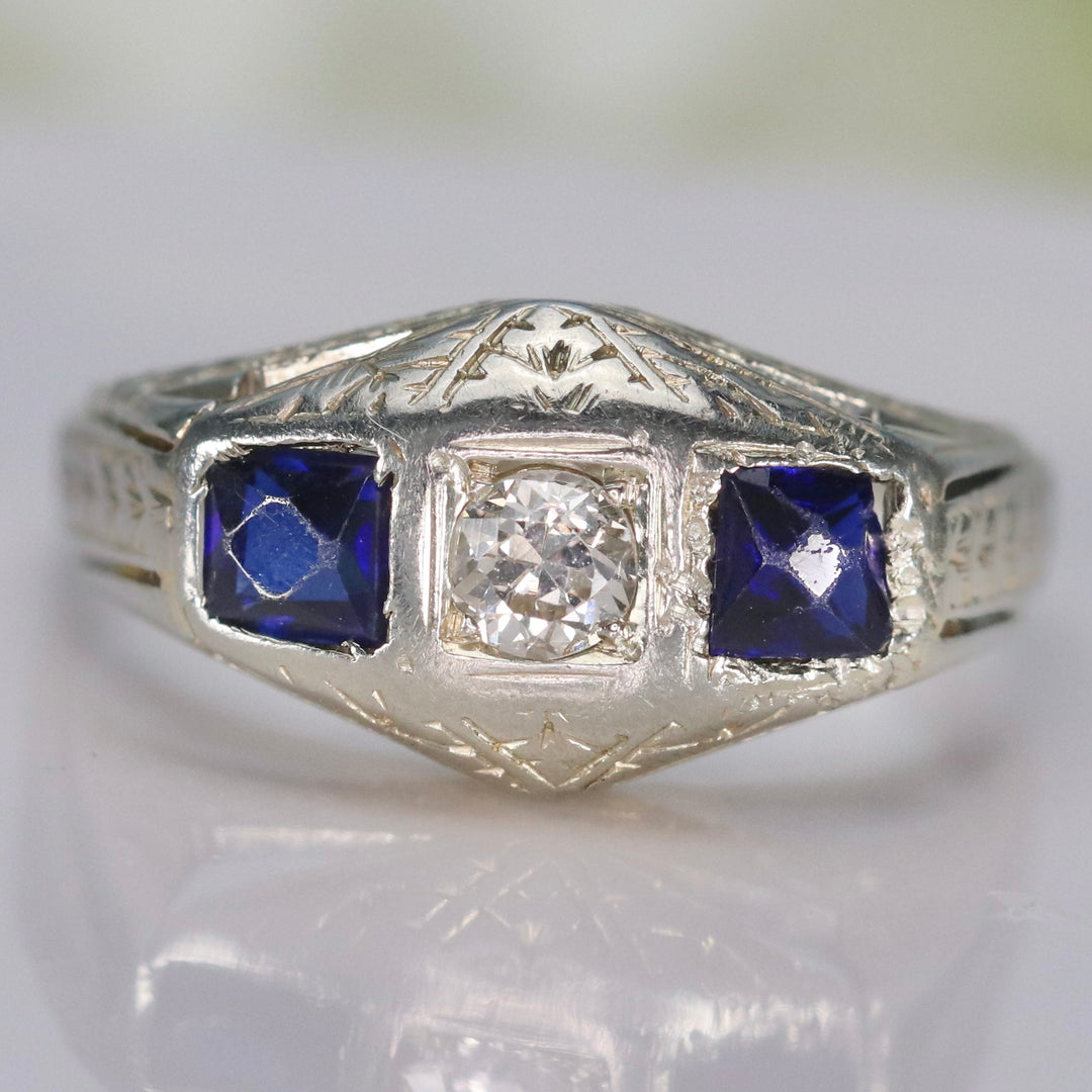 Vintage ring with diamond and french cut synthetic sapphires in 18k white gold