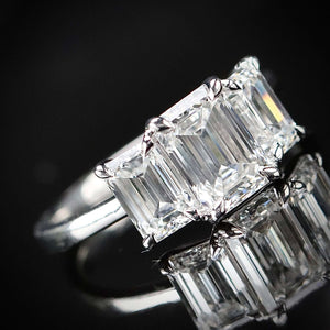 The Charlotte - 3 stone 3.03ctw lab grown emerald cut diamond ring in platinum
