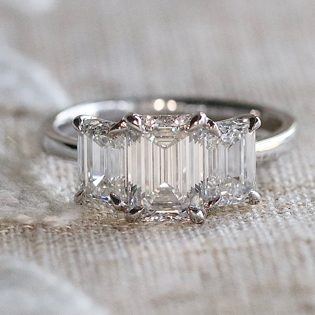 The Charlotte - 3 stone 3.03ctw lab grown emerald cut diamond ring in platinum