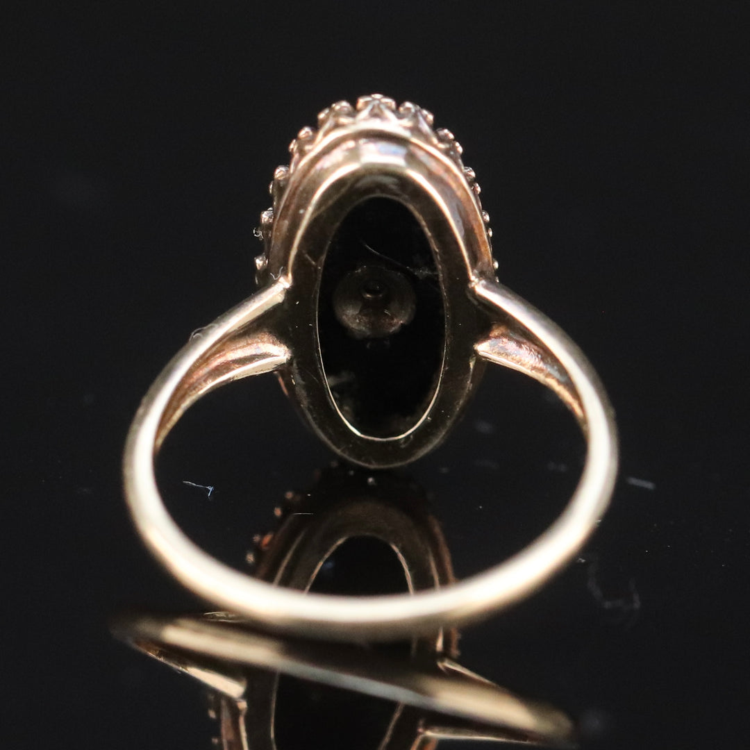 Vintage onyx ring with opal in yellow gold from Manor Jewels.