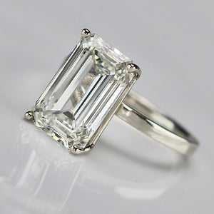 6.03ct emerald cut lab grown solitaire diamond ring in 14k white gold