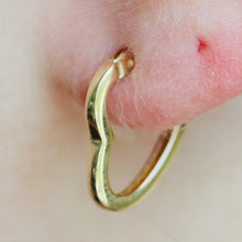 Load image into Gallery viewer, Heart shaped hoops in 14k yellow gold