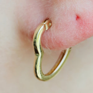 Heart shaped hoops in 14k yellow gold