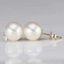 Load image into Gallery viewer, Classic pearl studs in 14k yellow gold