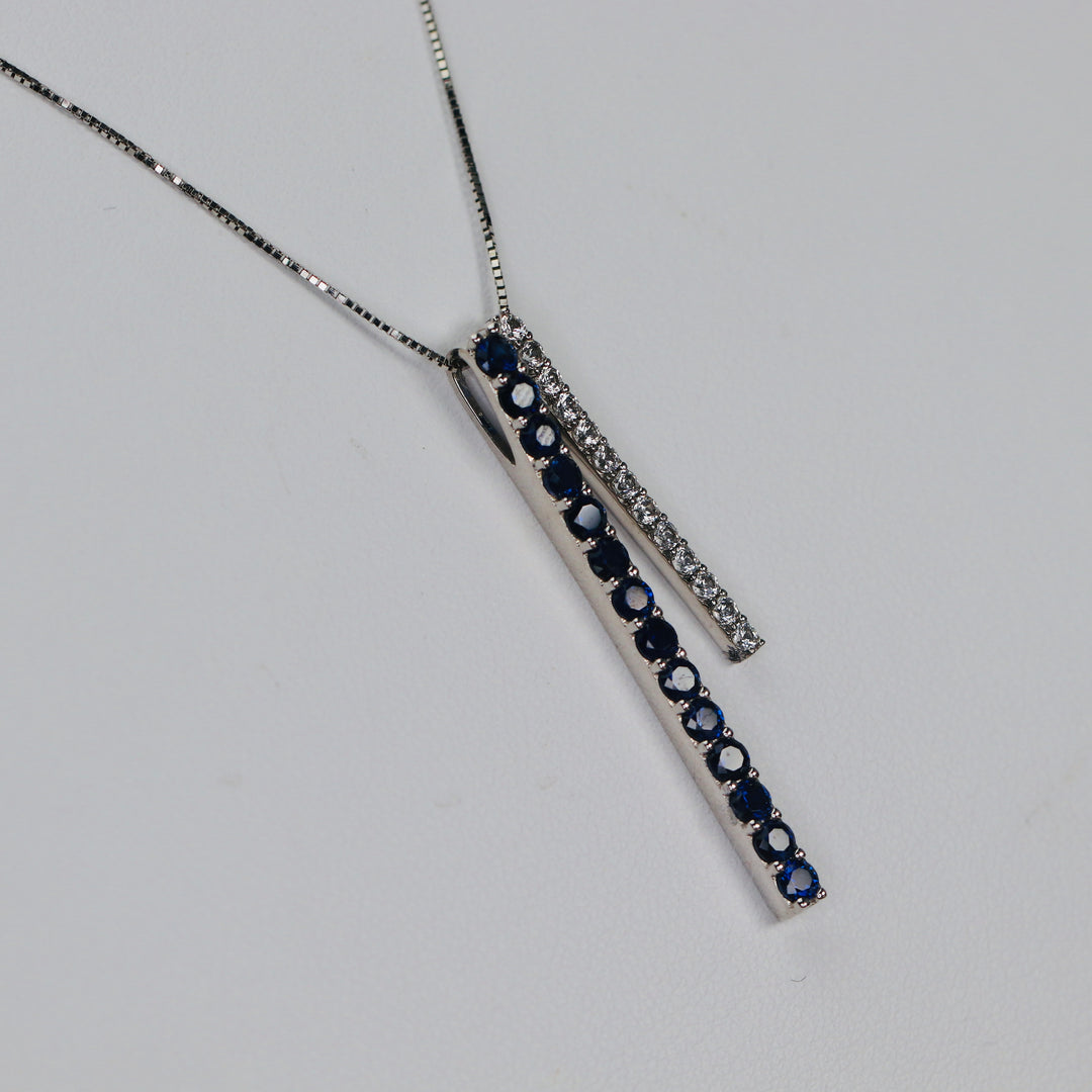 Blue and white synthetic sapphire necklace in white gold