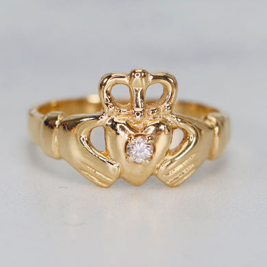 Diamond claddagh ring in yellow gold