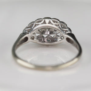 Princess style diamond ring in 14k white gold