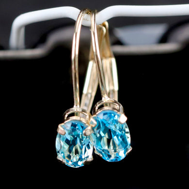 Blue topaz leverback earrings in yellow gold