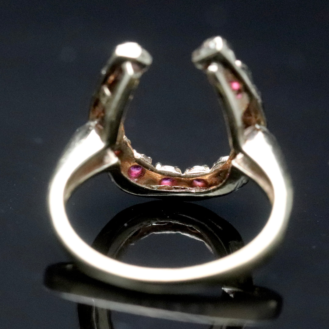 Vintage ring with synthetic rubies in a horseshoe shape in yellow gold