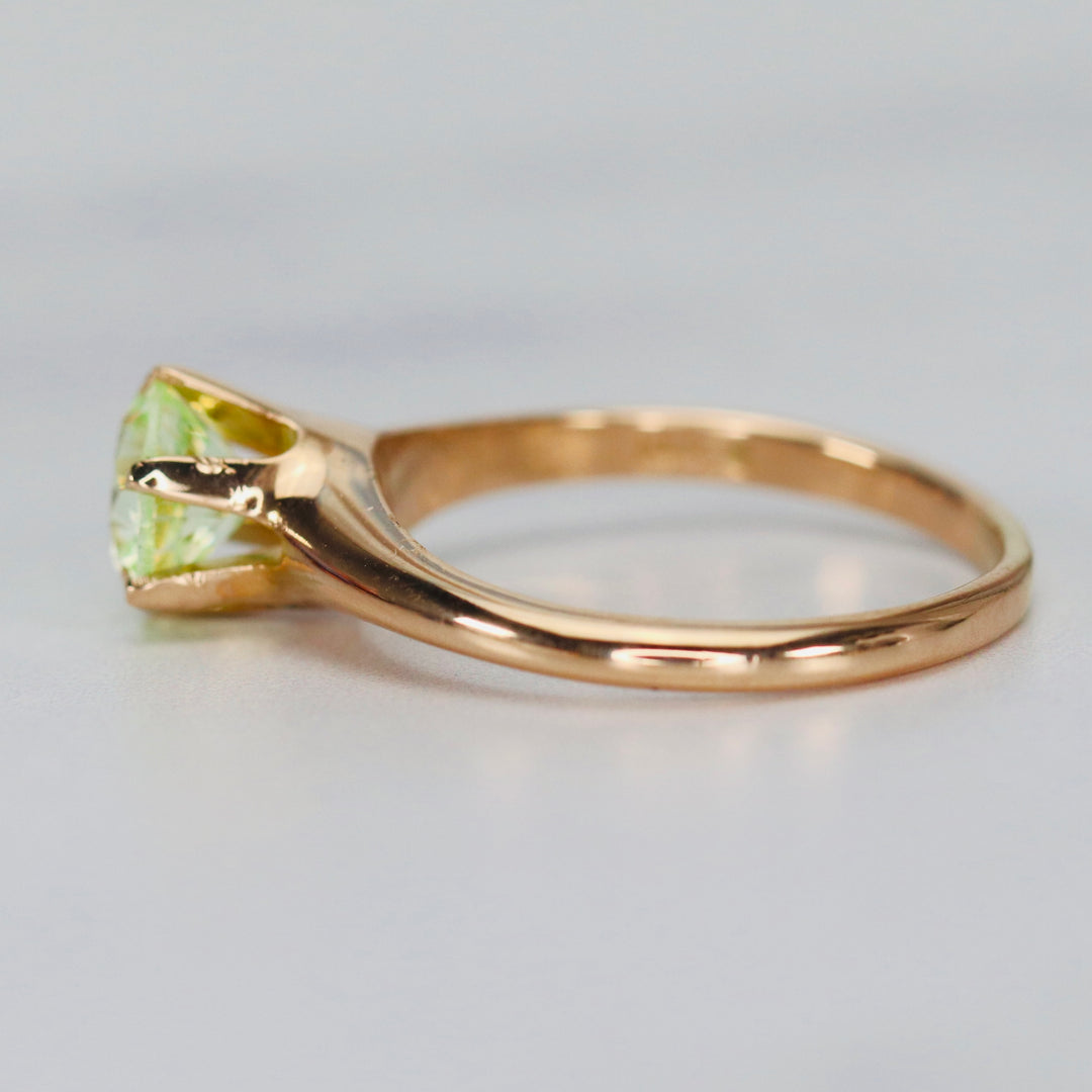 Vintage ring with synthetic green spinel in 14k yellow gold