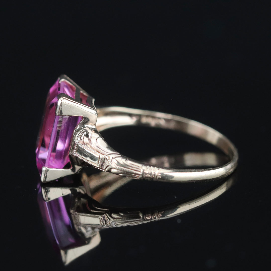 Vintage ring with synthetic pink sapphire in yellow gold from Manor Jewels.