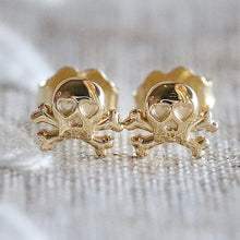 Load image into Gallery viewer, 14k yellow gold skull and crossbones studs