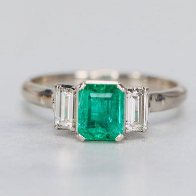 Estate emerald and diamond ring in platinum