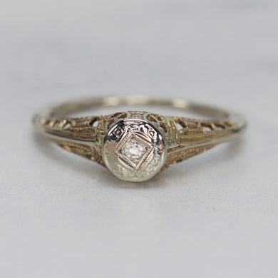 Detailed antique diamond filigree ring in 14k white gold