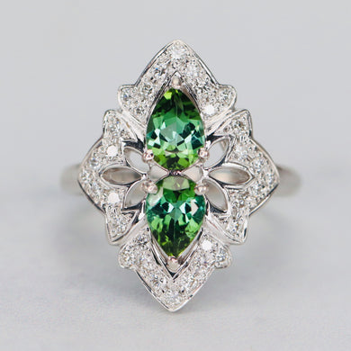 Green tourmaline and diamond ring in platinum