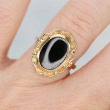 Load image into Gallery viewer, Classic onyx ring in a framed setting of yellow gold