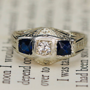 Vintage ring with diamond and french cut synthetic sapphires in 18k white gold