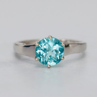 Apatite solitaire ring in white gold