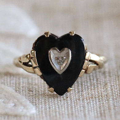Heart shaped onyx and diamond ring in yellow gold