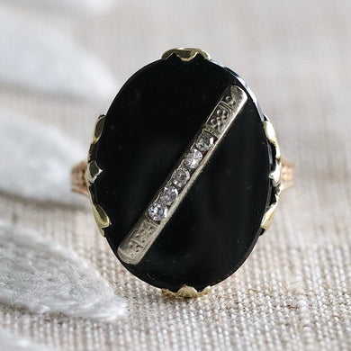Oval onyx and diamond vintage ring in yellow gold from Manor Jewels