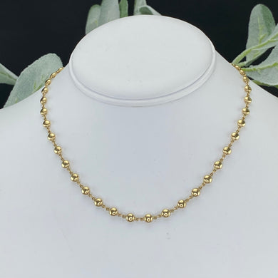 Beaded station necklace in 14k yellow gold