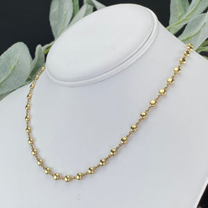 Beaded station necklace in 14k yellow gold