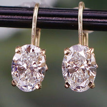 Load image into Gallery viewer, RESERVED: LAYAWAY PAYMENT 2 OF 3: 2.18ctw D/VVS2 lab grown oval diamond earrings in 14k yellow gold