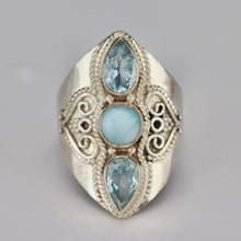 Load image into Gallery viewer, Sterling silver laminar and blue topaz ring