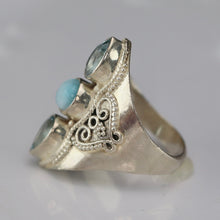 Load image into Gallery viewer, Sterling silver laminar and blue topaz ring