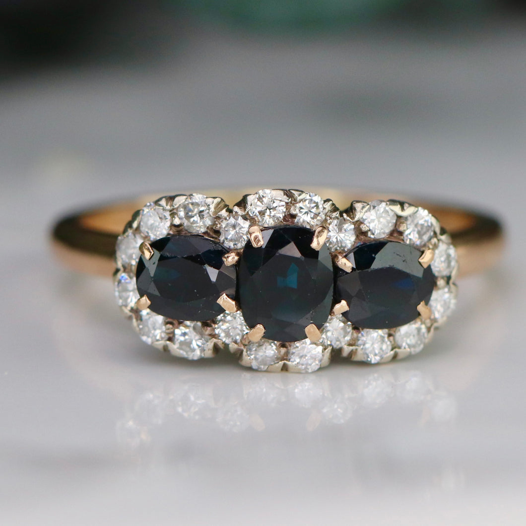 Estate sapphire and diamond ring in 14k yellow and white gold