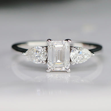 1.50ctw emerald cut and pear shaped lab grown diamond ring in 14k white gold