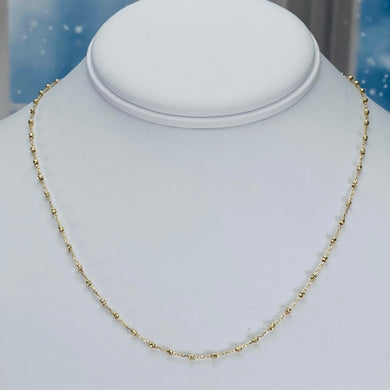 Beaded station necklace in yellow gold