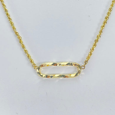 Twisted oval paperclip link necklace in yellow gold