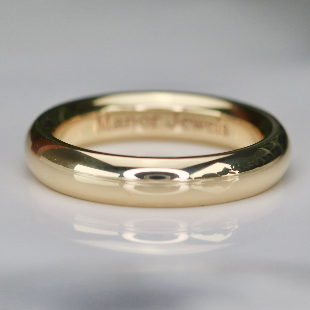 Heavy comfort fit 4mm band in your choice of 14k gold