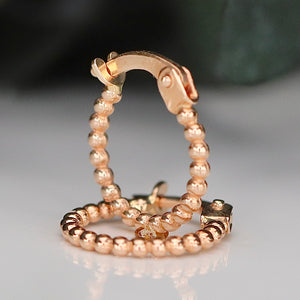 Beaded Huggies in 14k rose gold