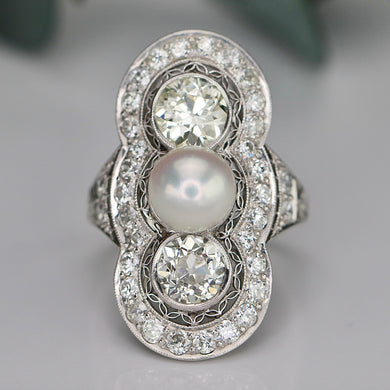 Estate vintage old european cut diamond and pearl ring in platinum