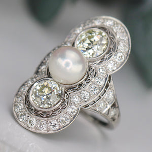 Estate vintage old european cut diamond and pearl ring in platinum