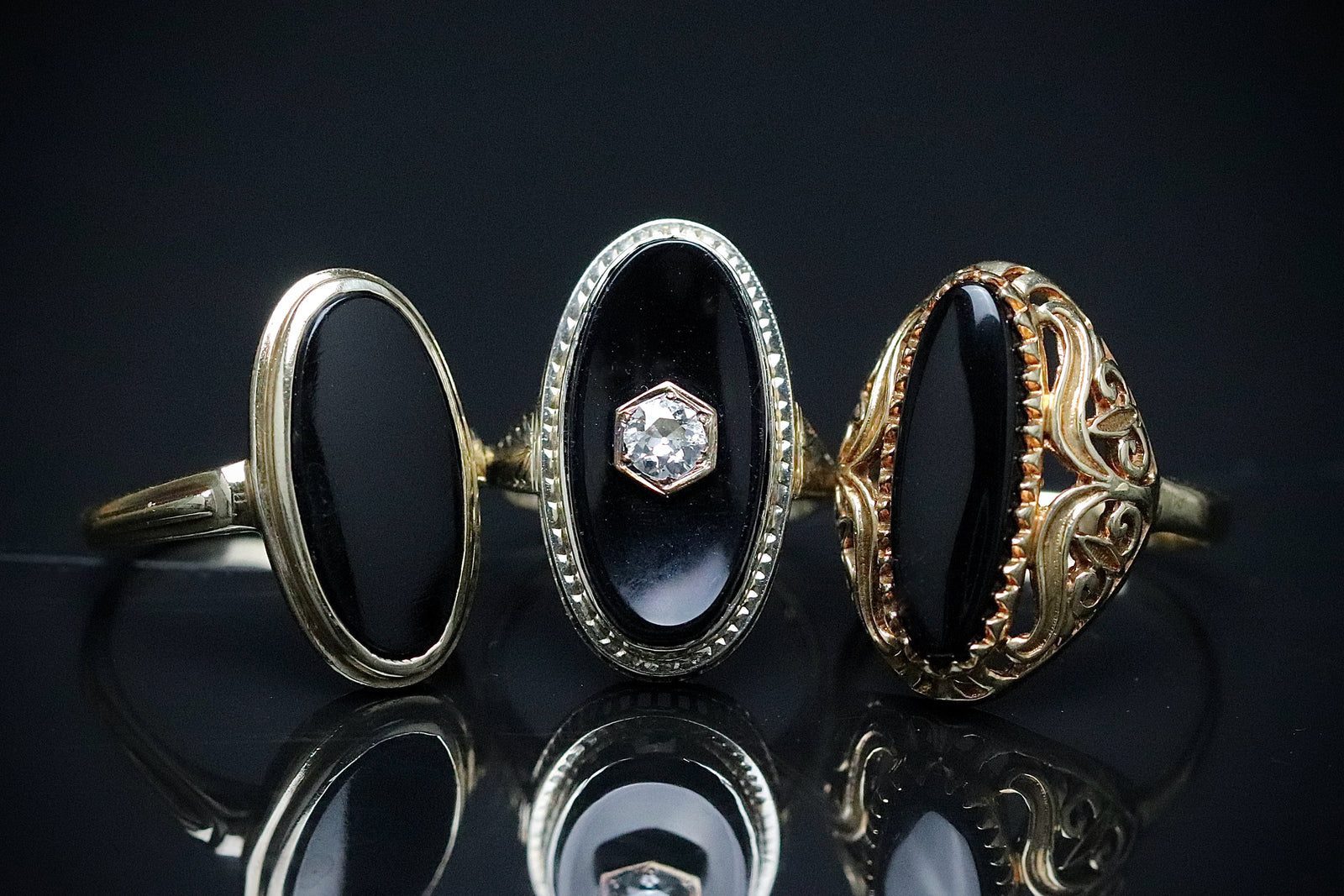 Vintage onyx rings in yellow and white gold from Manor Jewels