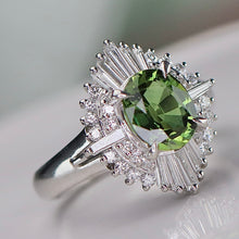 Load image into Gallery viewer, Green sapphire and diamond ballerina style ring in platinum