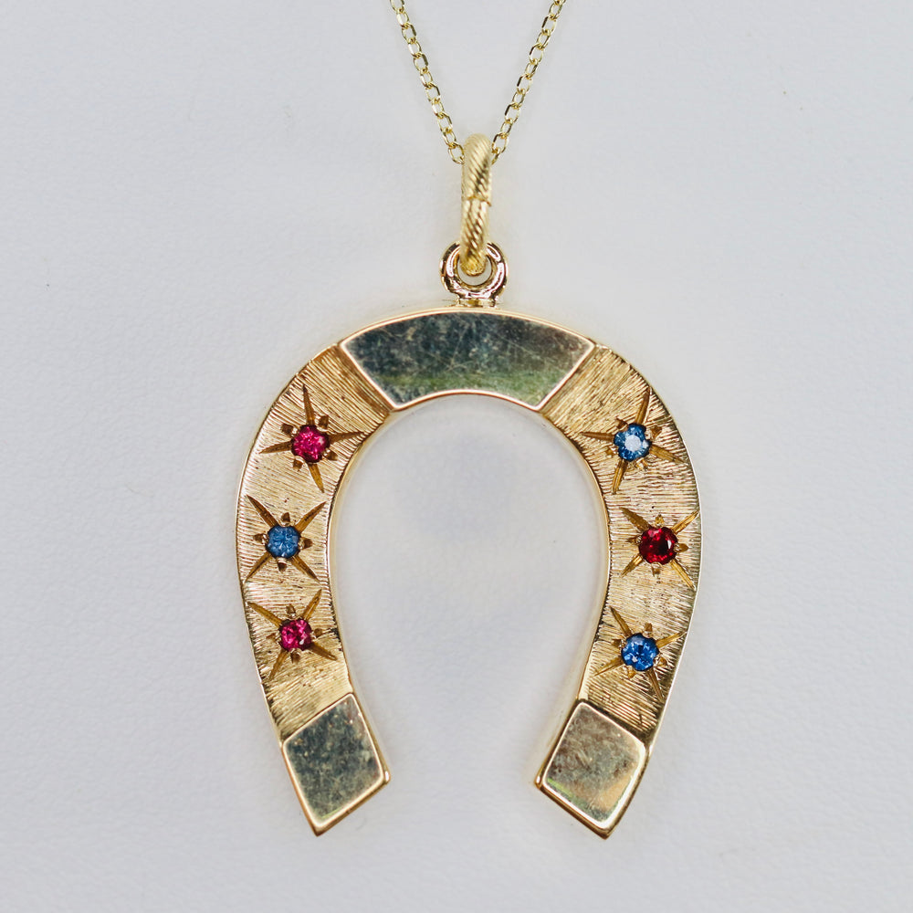 Estate vintage horseshoe necklace in yellow gold