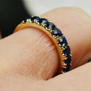 High quality sapphire band in 14k yellow gold