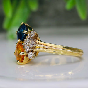 Blue and yellow sapphire and diamond ring in 18k yellow gold