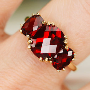 Checkerboard 3 stone garnet ring in 14k yellow gold