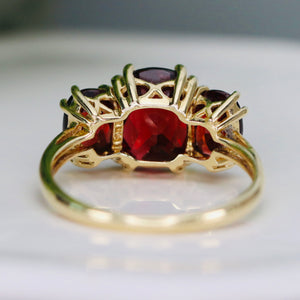Checkerboard 3 stone garnet ring in 14k yellow gold