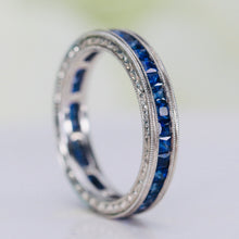 Load image into Gallery viewer, Engraved sapphire eternity band in engraved platinum