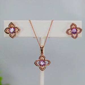Amethyst necklace and earrings set in rose gold