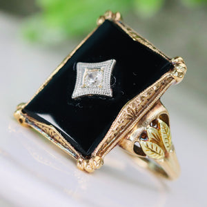 Vintage Onyx and diamond ring in yellow gold